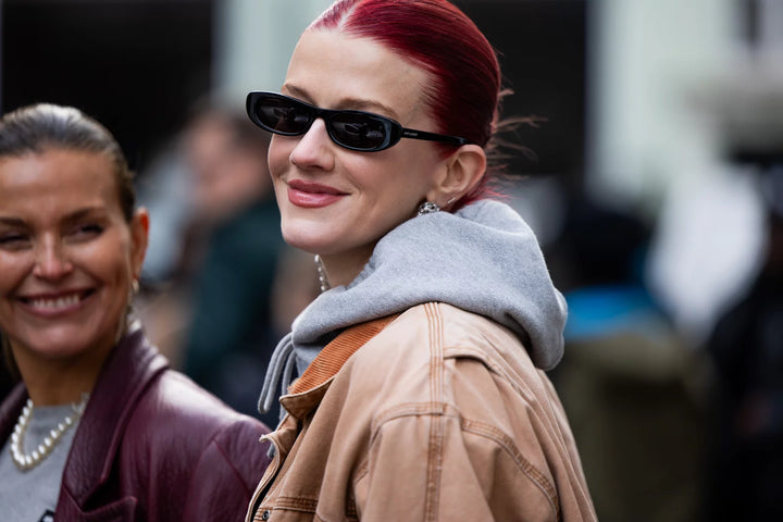 girl with sunglasses and cherry red hair