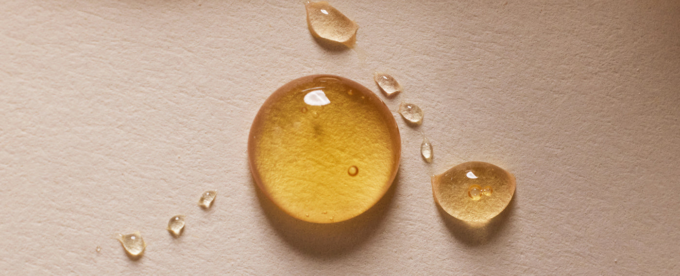 drop of oil on a neutral background