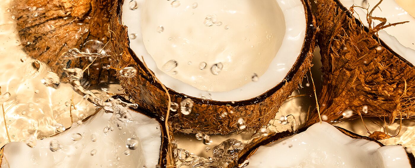 coconut halves covered by water