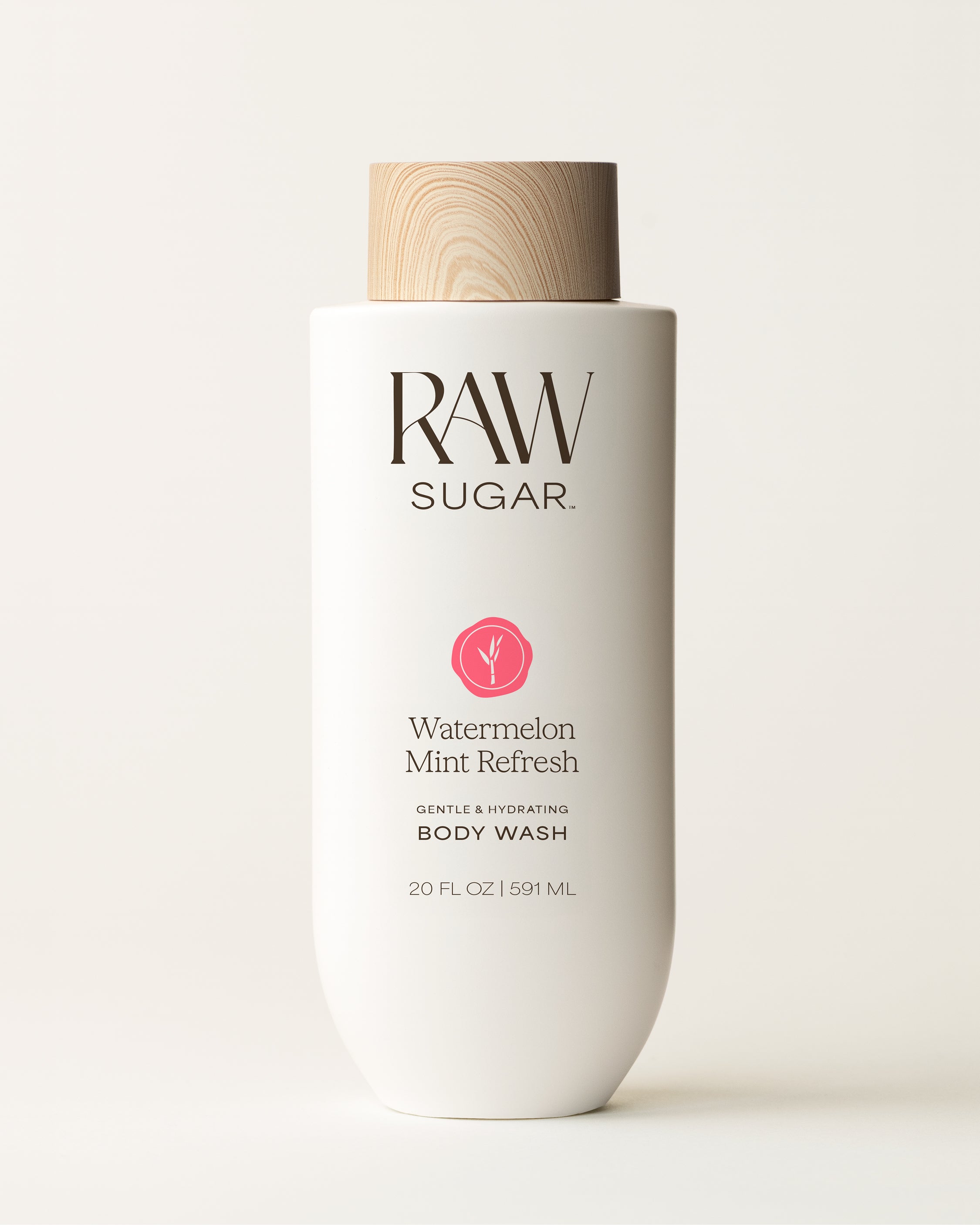 RAW Sugar body wash bottle with watermelon mint refresh scent on a white background