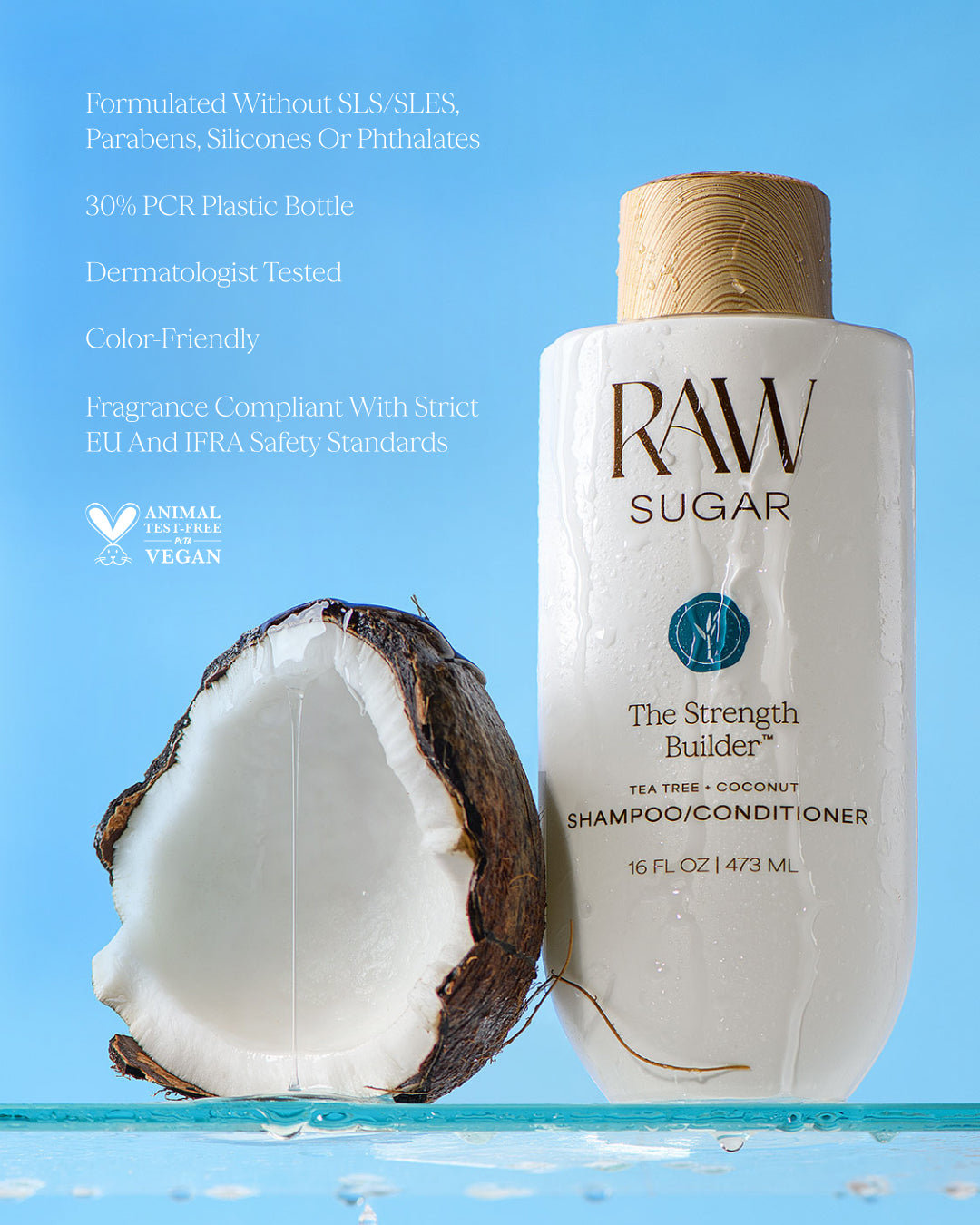 RAW Sugar shampoo/conditioner bottle with a coconut next to it on a blue background