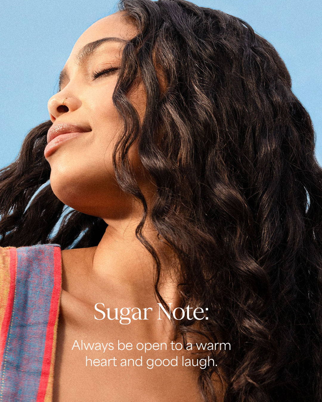 Woman with long, wavy hair against a blue sky with 'Sugar Note' text.