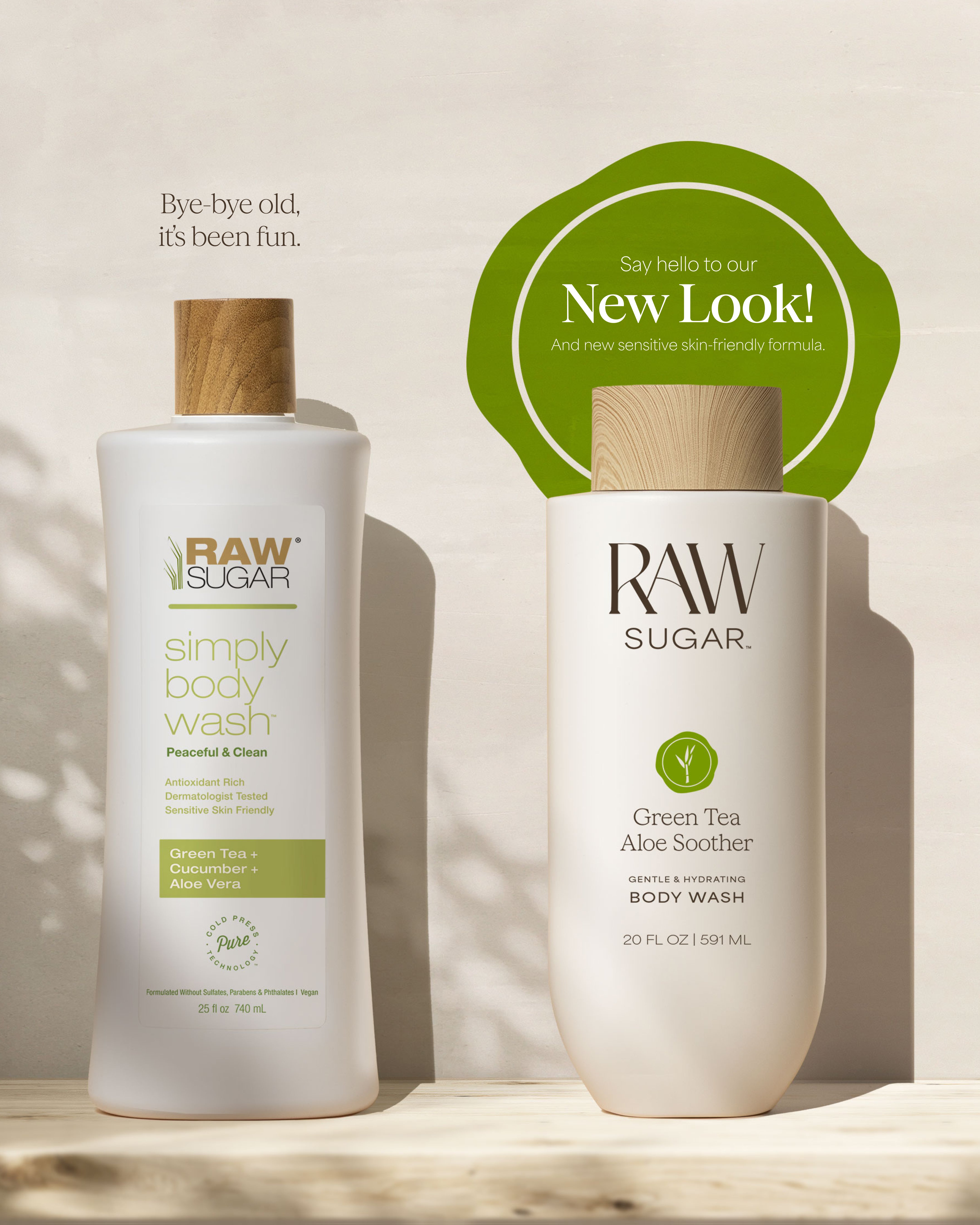 Two bottles of Raw Sugar body wash on a wooden surface with a neutral background for Raw Sugar Body Wash designed to help gently cleanse and hydrate skin with clean ingredients.