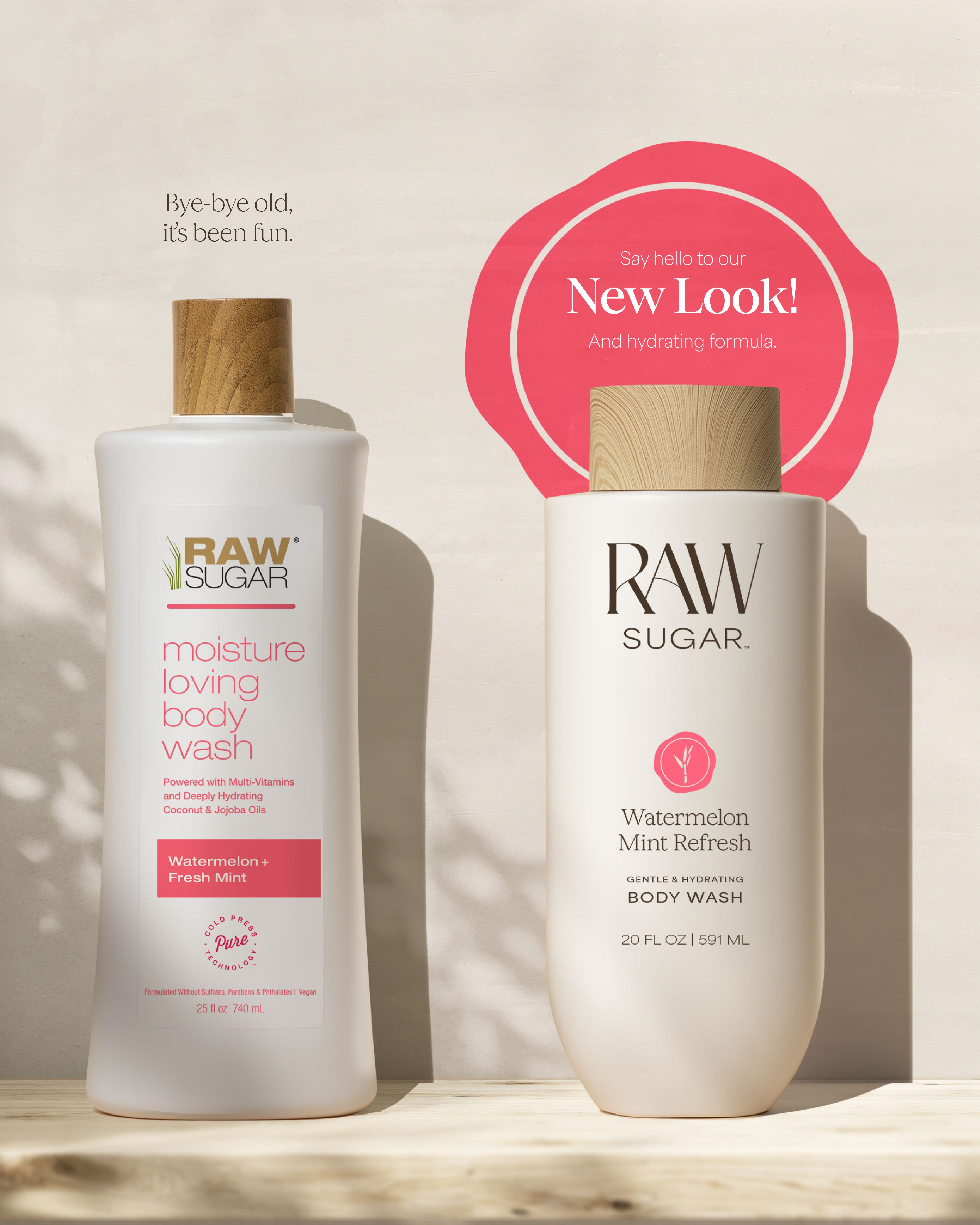 Two bottles of Raw Sugar body wash with a pink circular sign indicating a new look, designed to help gently cleanse and hydrate skin with clean ingredients.
