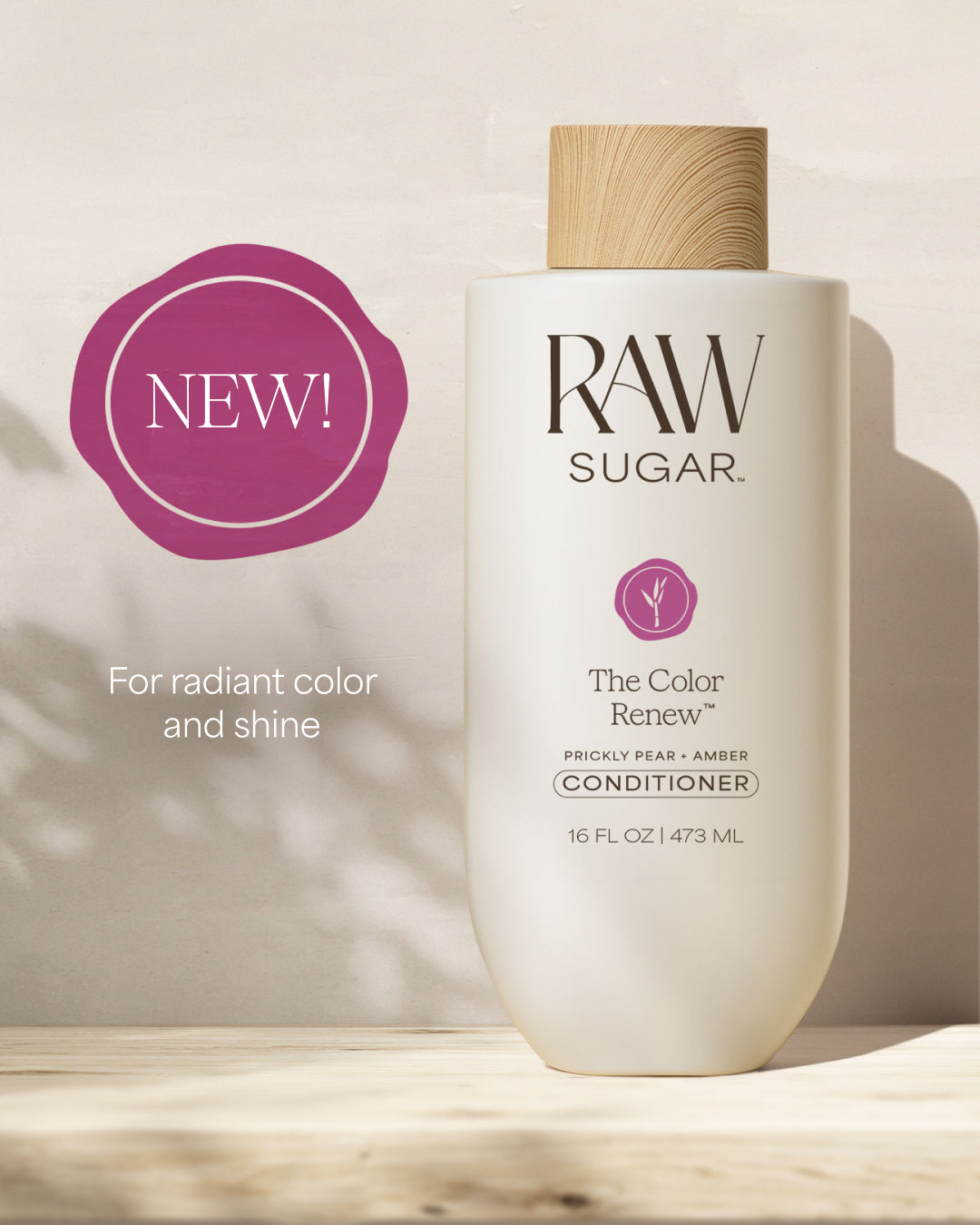 RAW Sugar conditioner bottle with a 'NEW!' label on a neutral background