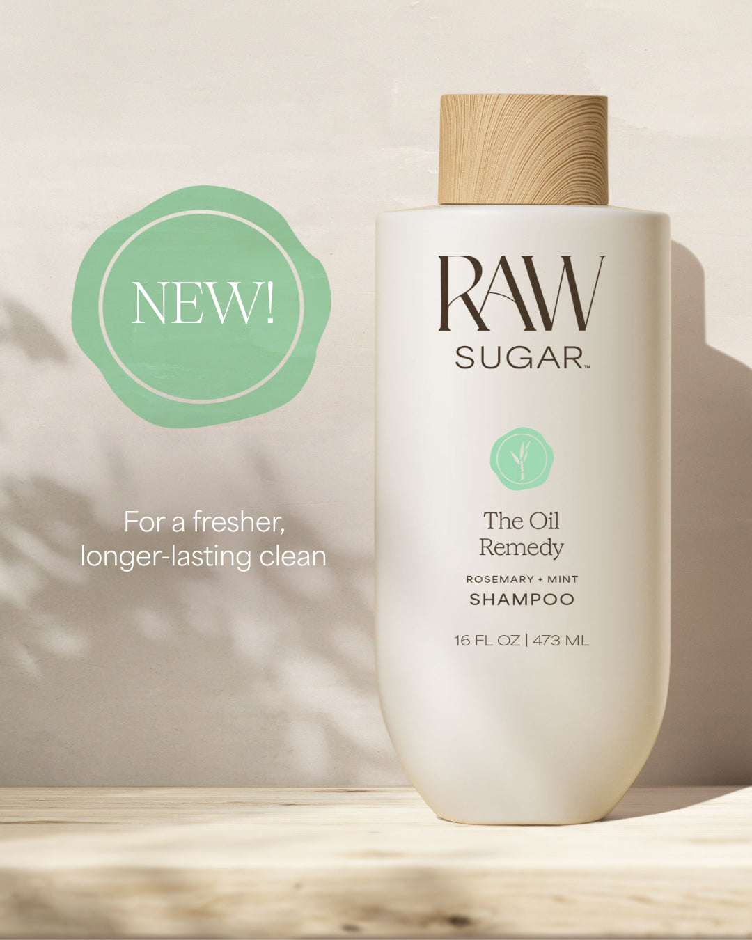 RAW SUGAR Oil Remedy shampoo bottle with a wooden cap on a light background, designed to help balance hair with clean ingredients.