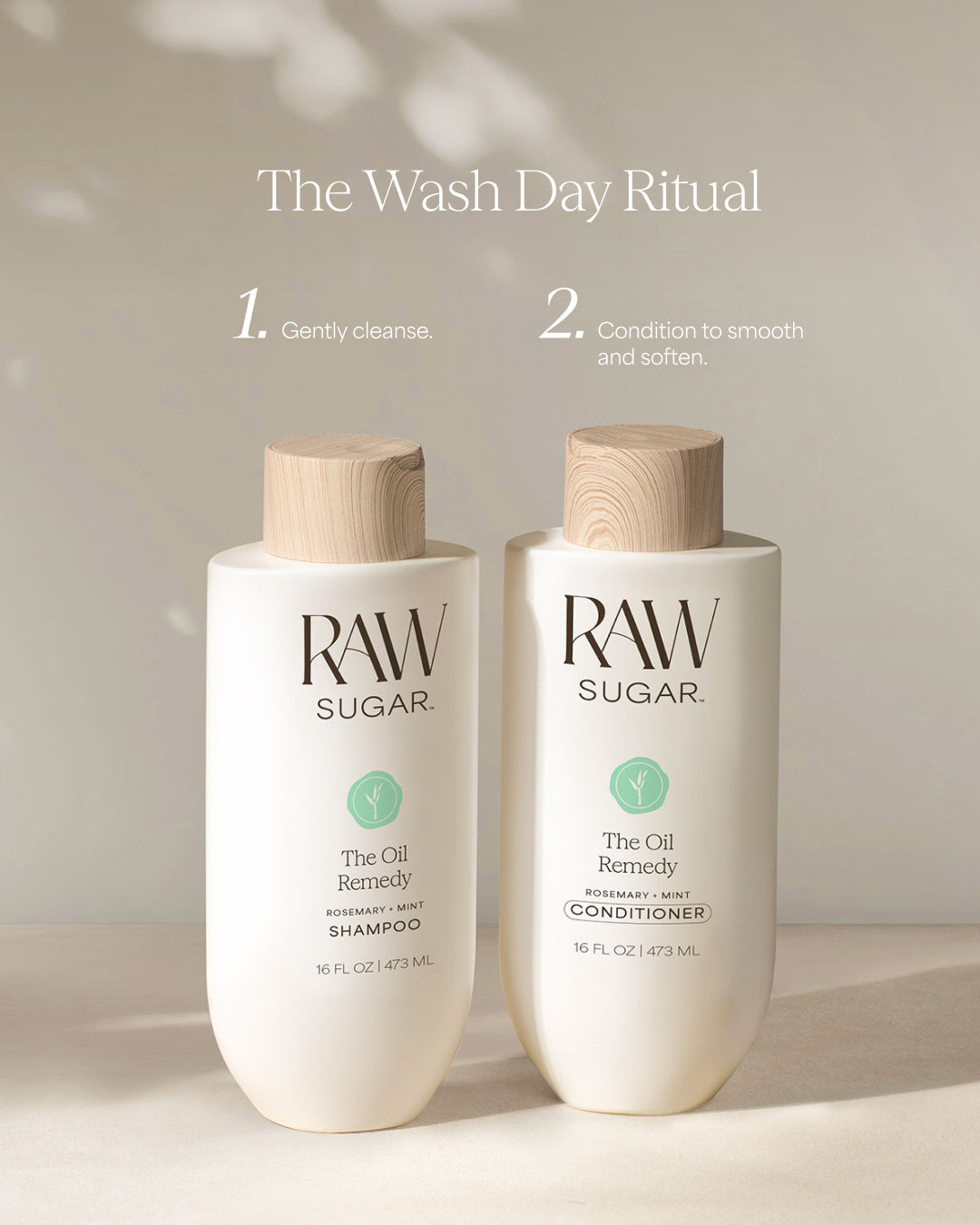 Two bottles of Raw Sugar shampoo and conditioner on a neutral background, designed to help balance oil in hair with clean ingredients.