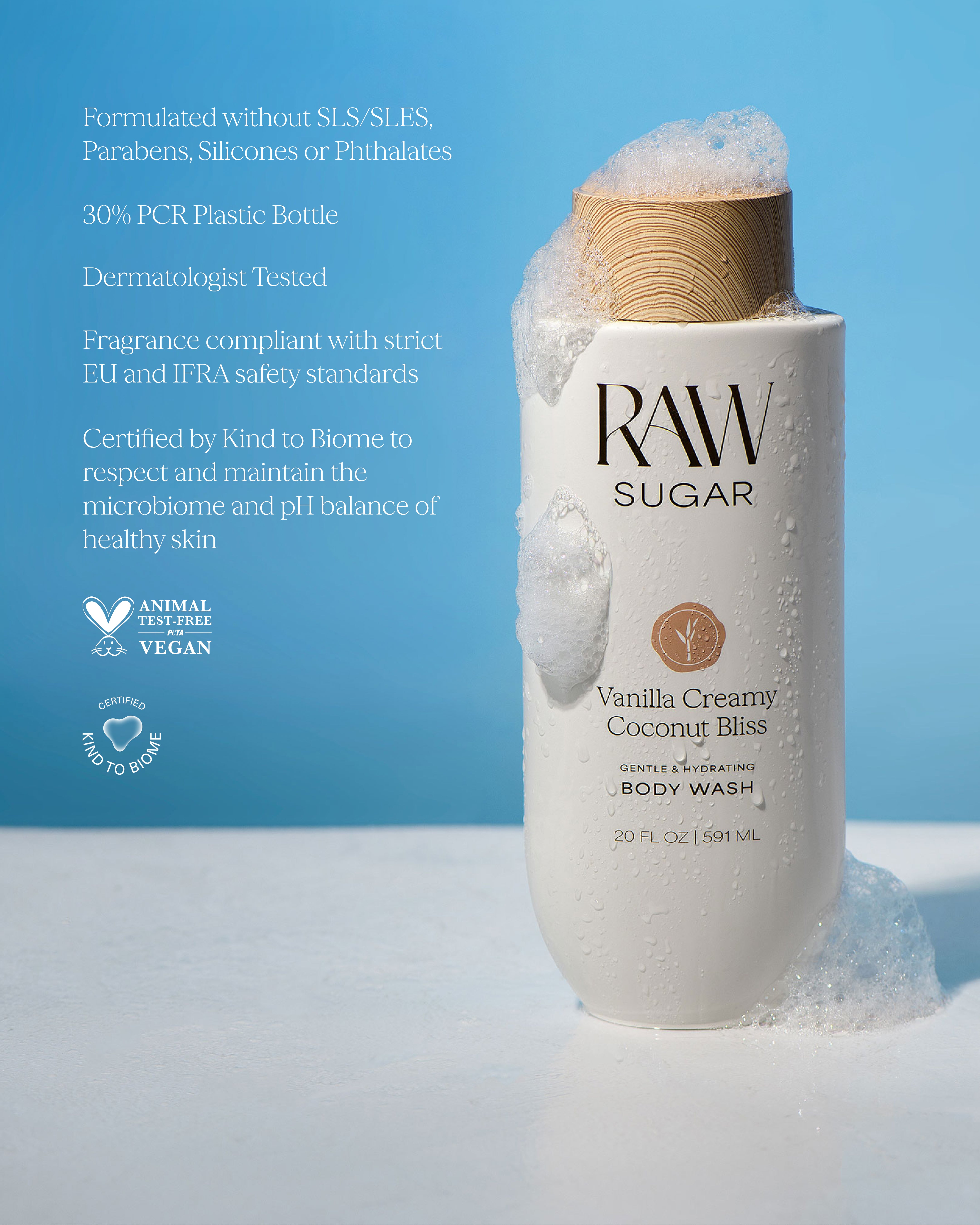 RAW Sugar Vanilla Creamy Coconut Bliss body wash bottle with a blue background,designed to help gently cleanse and hydrate skin with clean ingredients.