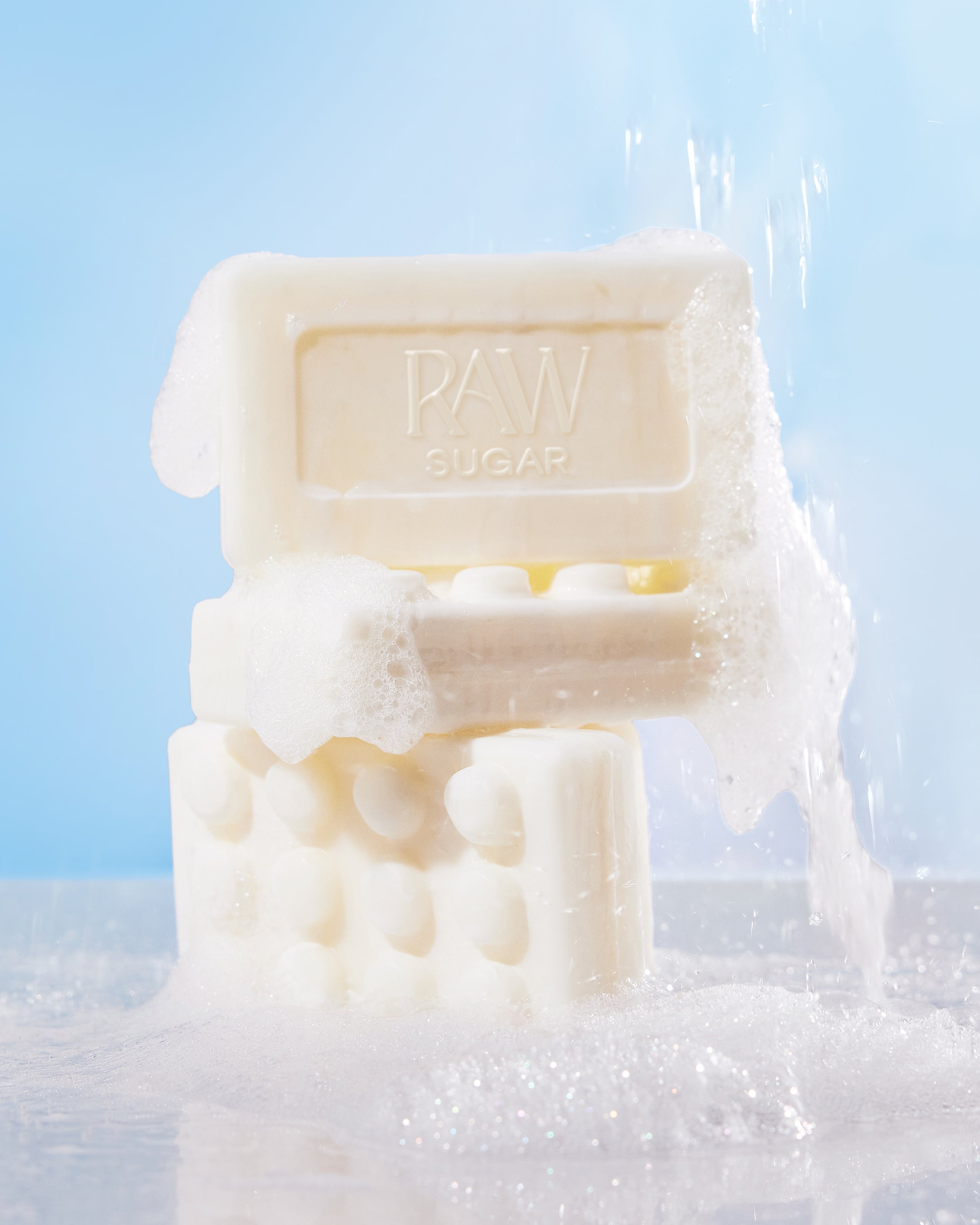 Bar of soap with 'RAW' branding on a blue background
