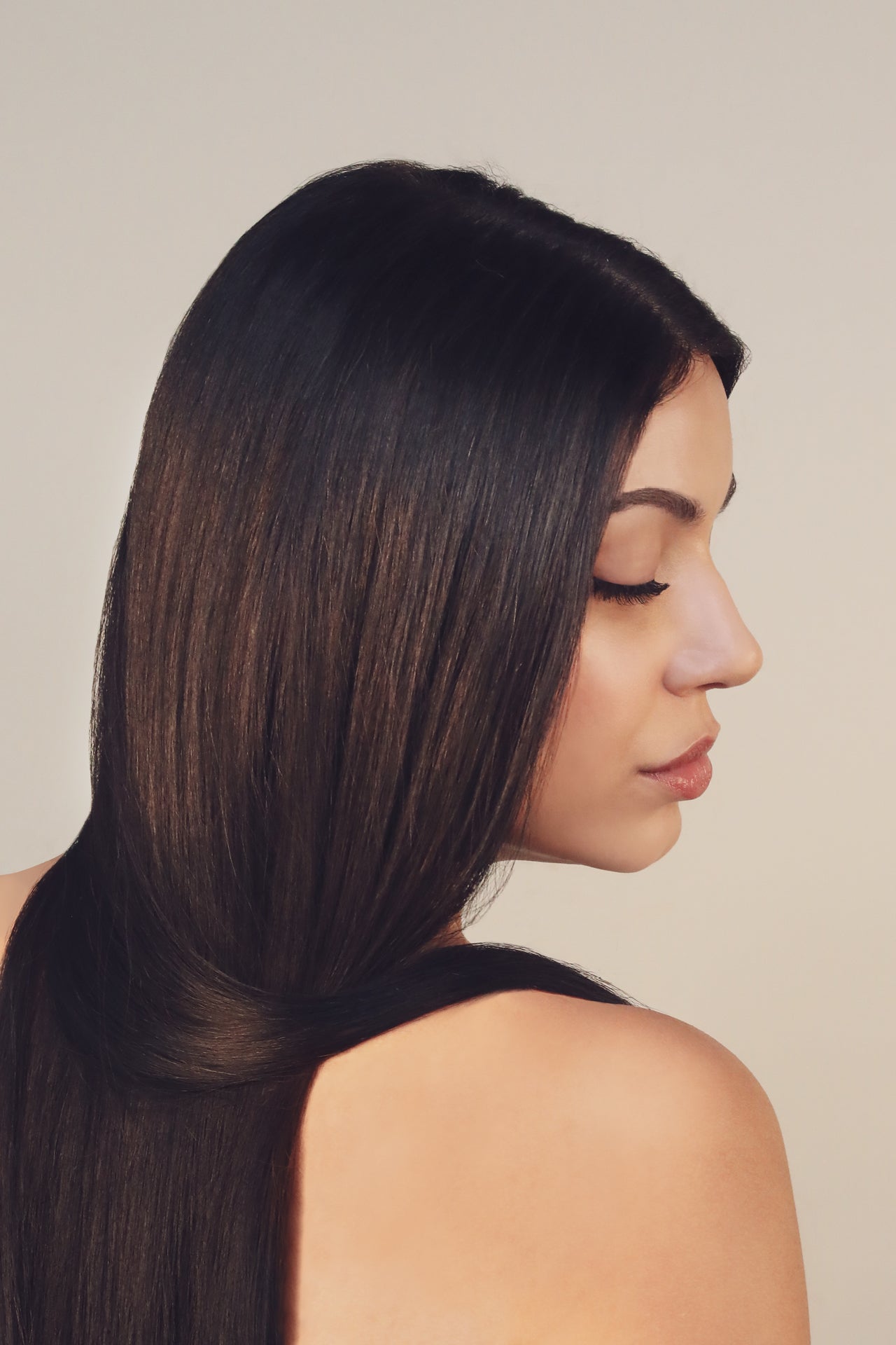 girl smiling with silky smooth hair
