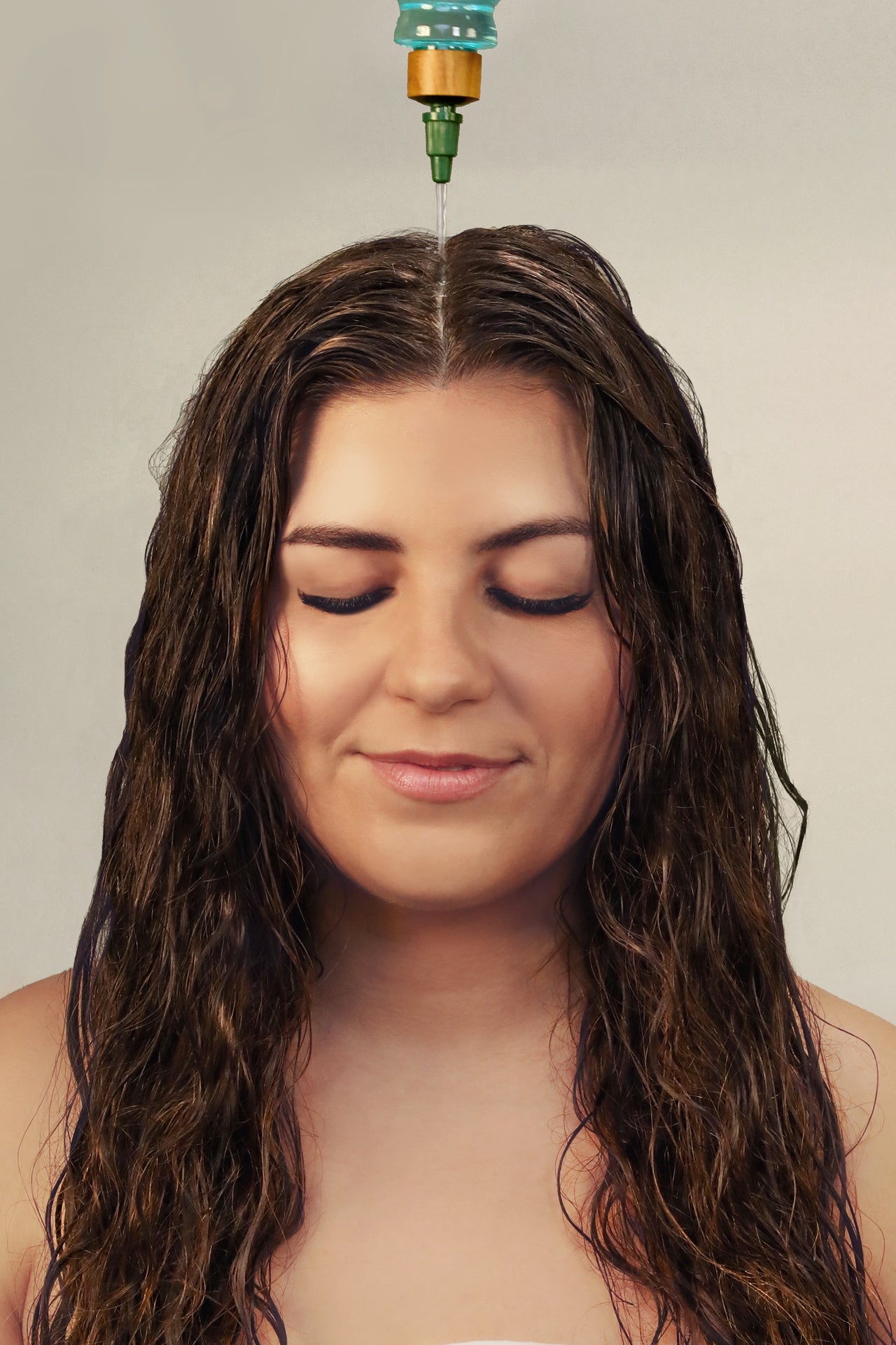 vinegar rinse dripping on woman with wet hair