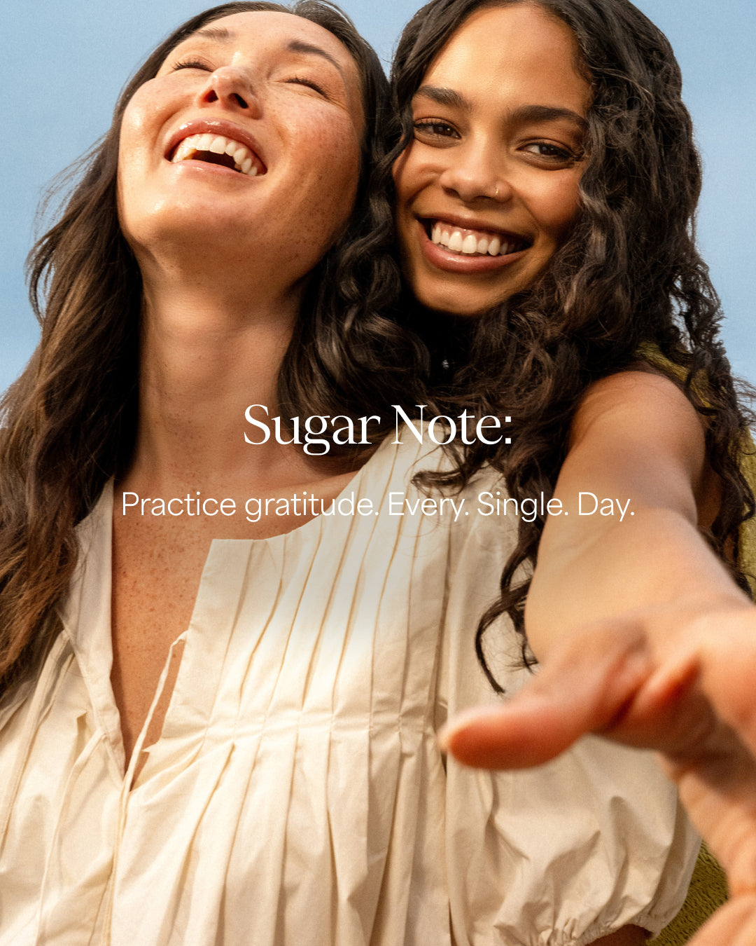 Two women smiling with 'Sugar Note' text overlay