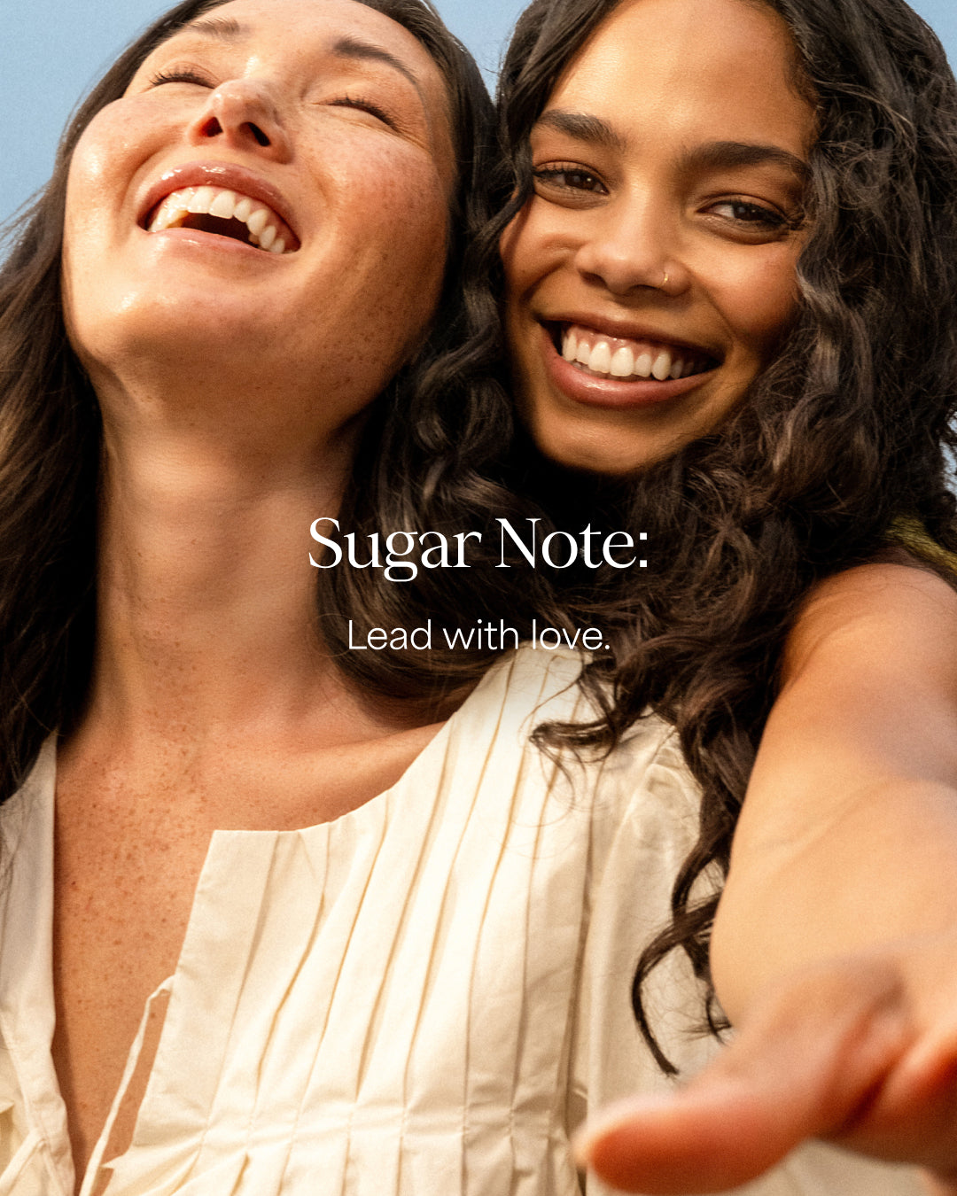 Two women smiling with 'Sugar Note' text overlay