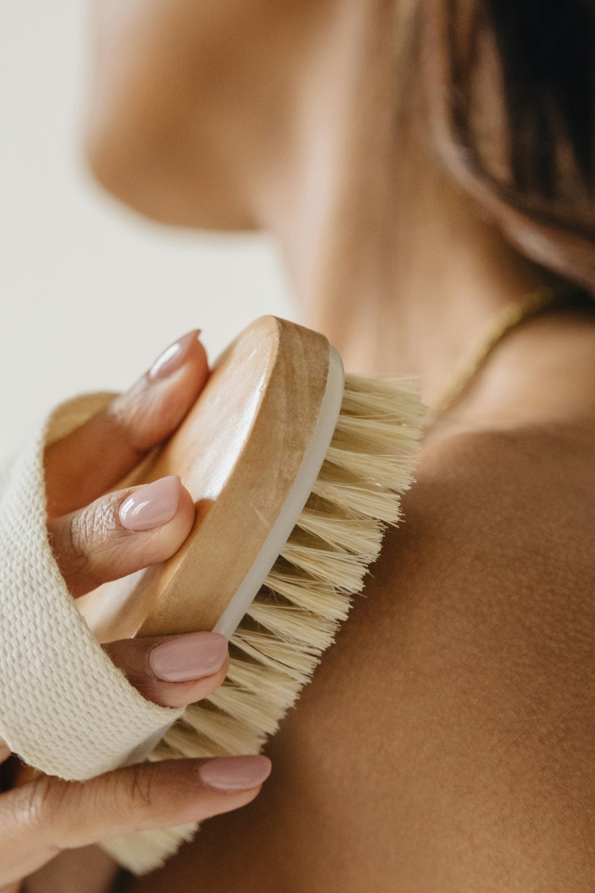person holding dry brush