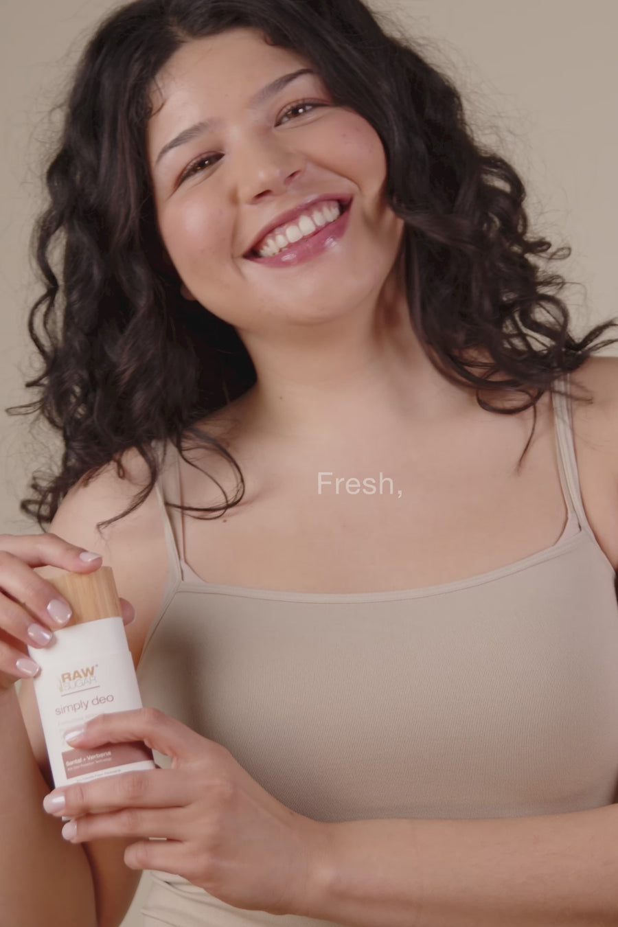 deo in use by woman smiling