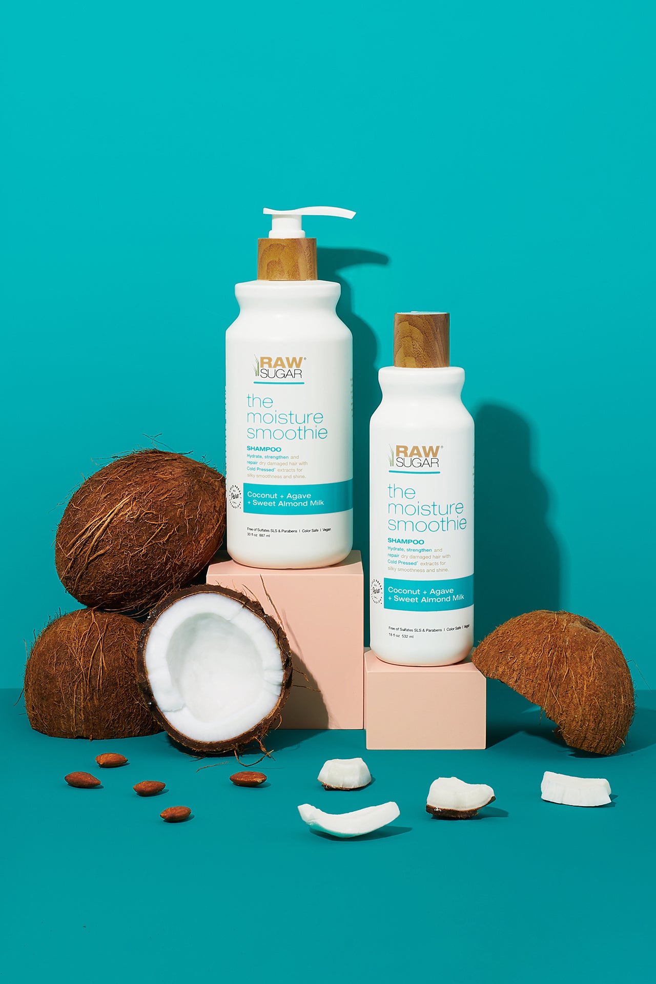 18 and 30 oz shampoos on risers next to coconuts