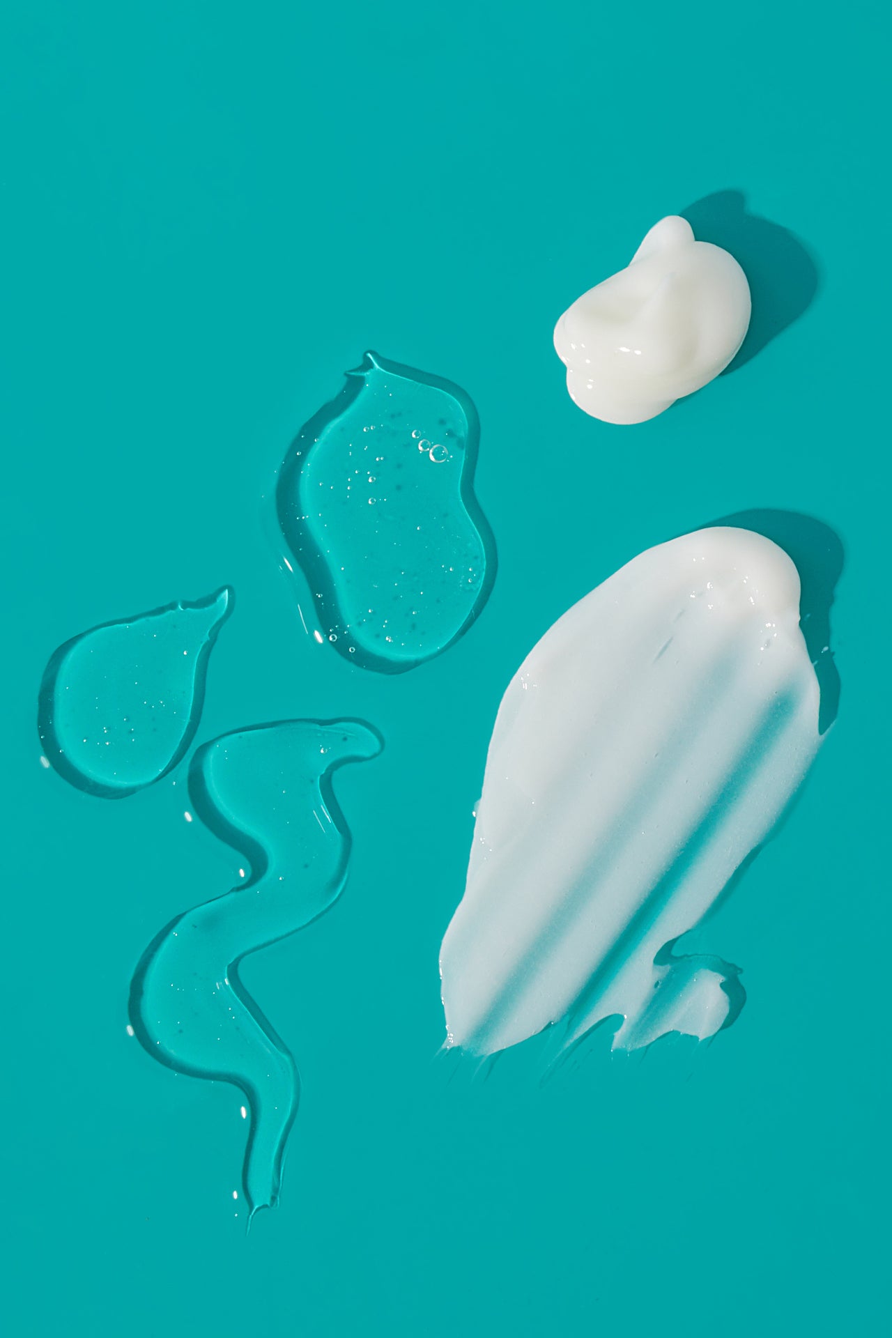 goops on teal background