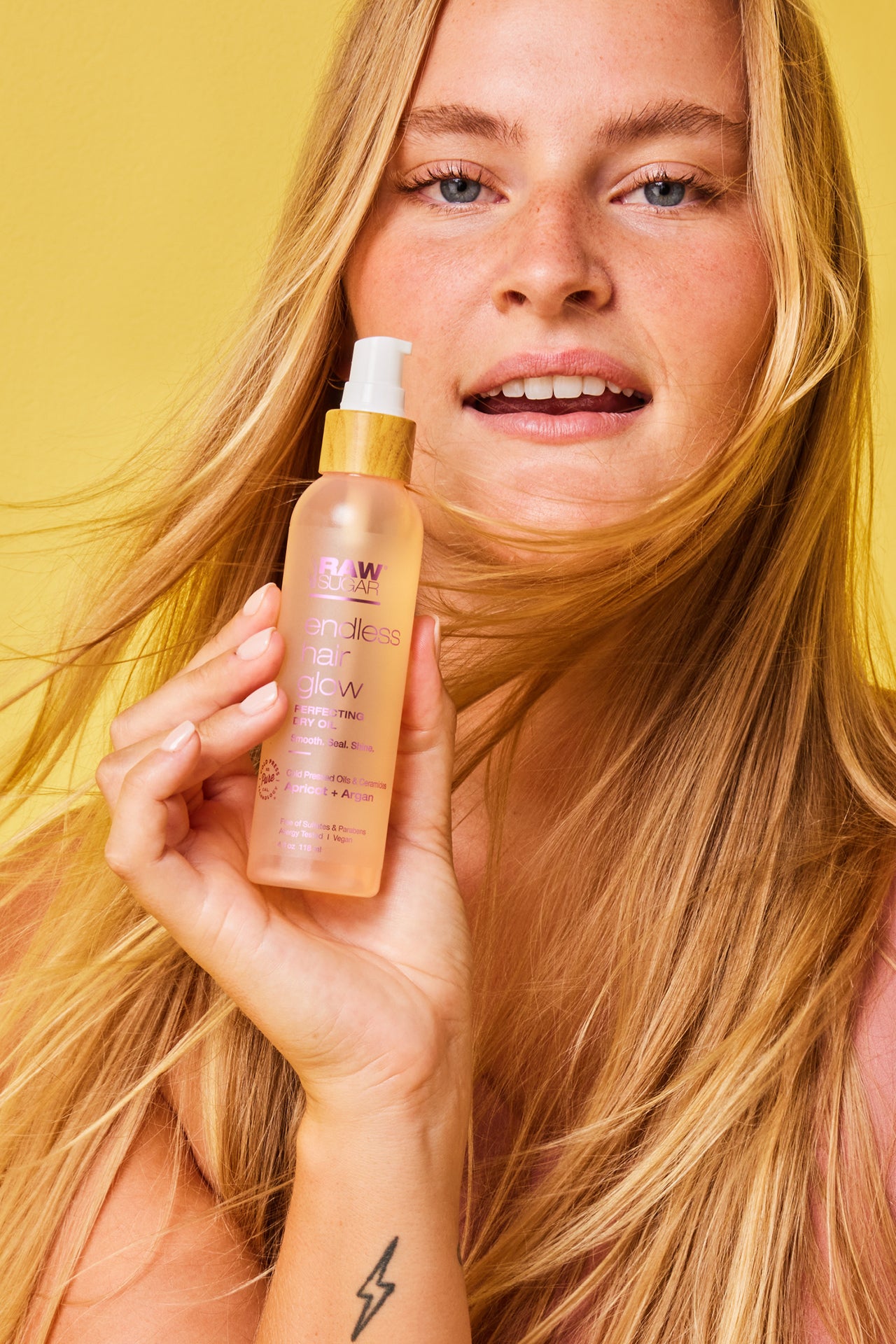 Woman Holding Hair oil