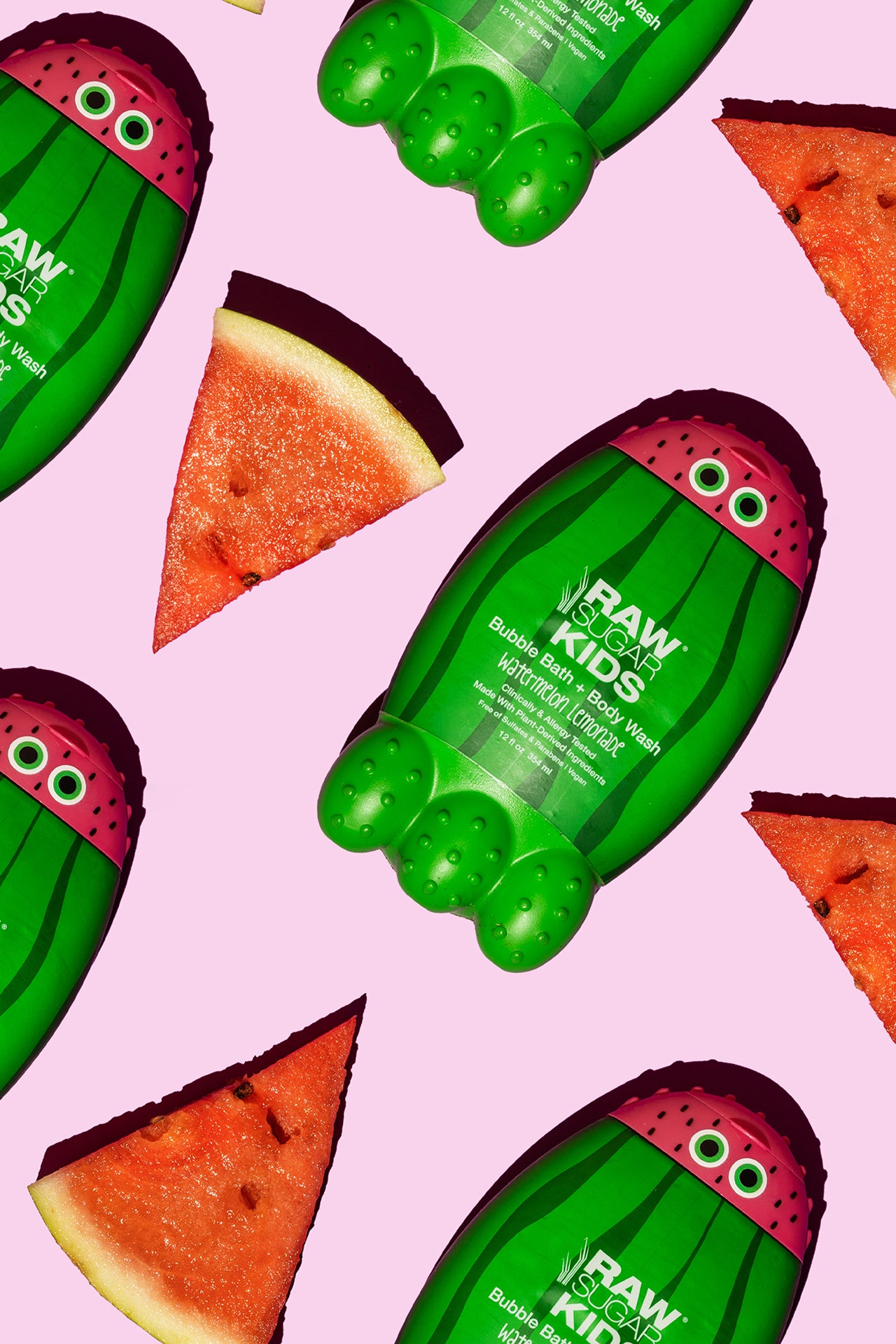 Raw Sugar Kids Watermelon Lemonade Monsters lying flat along side fresh watermelon triangle slices