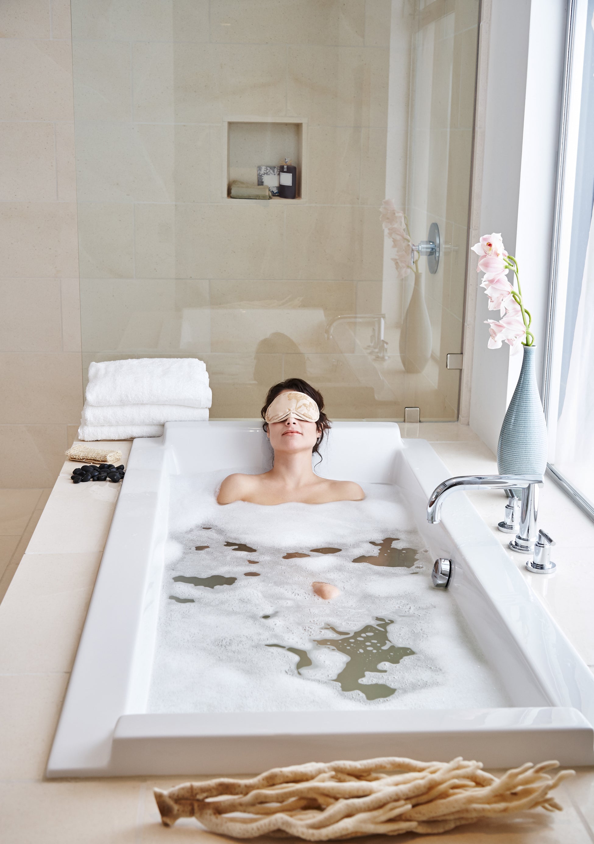 woman relaxing in bubble bath