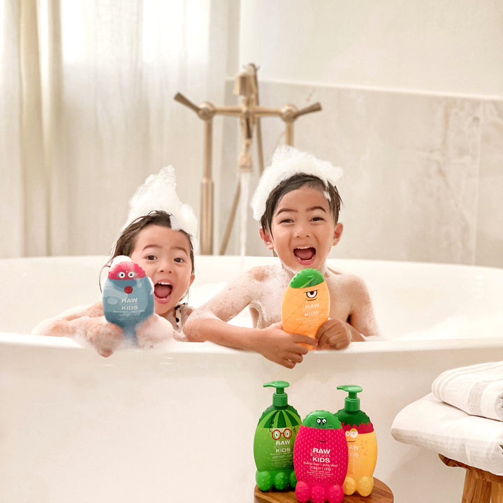 Kids using raw sugar living products in the bubble bath