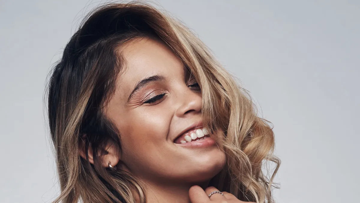 Girl smiling with curly hair