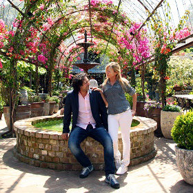 ronnie and donda in front of fountain