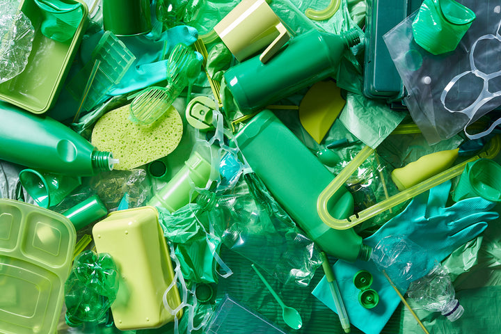 green plastic items piled