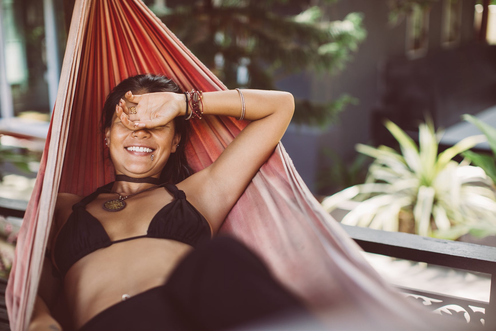girl relaxing in hammock