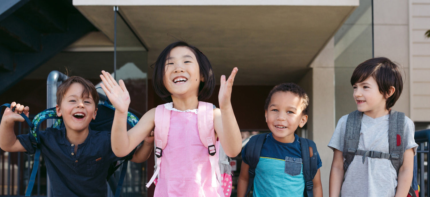 happy kids leaving class