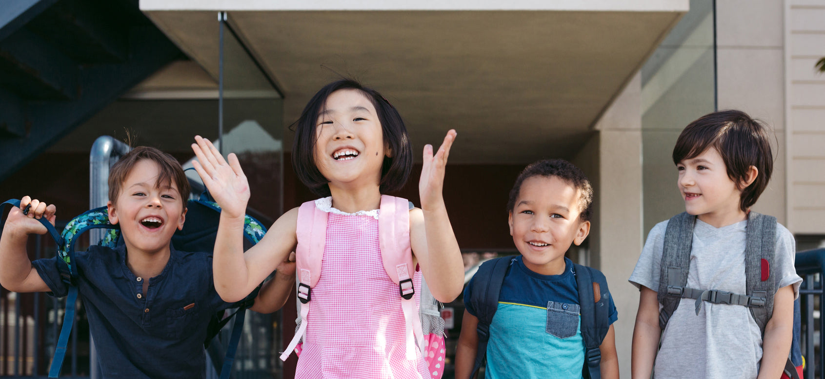 happy kids leaving class