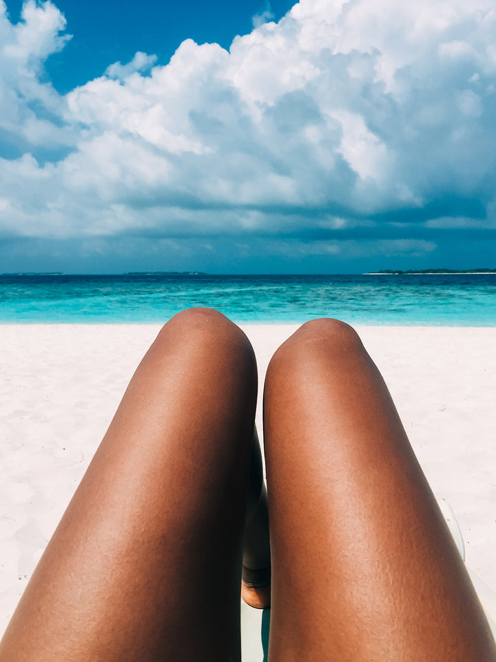 tan legs on beach