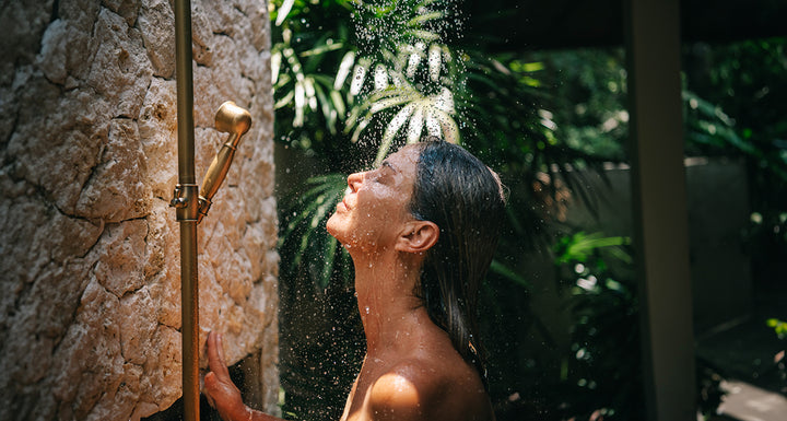 Girl showering in nature