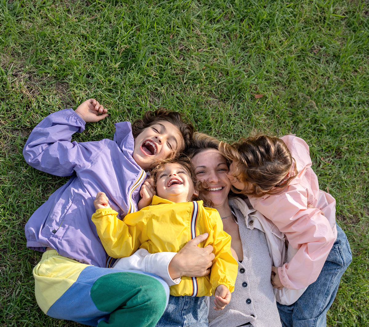 family having summer fun playing outside