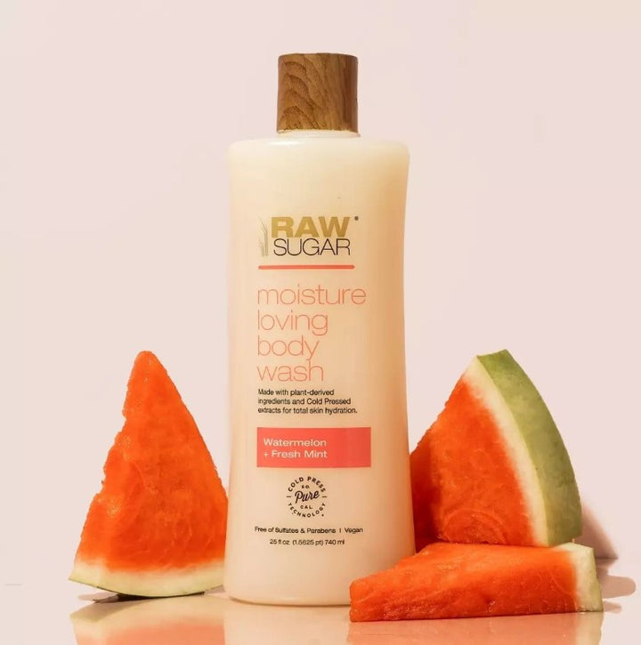 Raw Sugar Watermelon + Fresh Mint Moisture Loving Body Wash next to watermelon slices