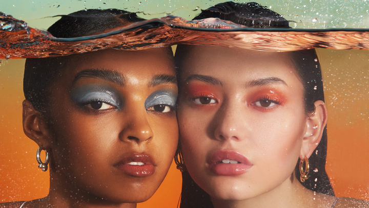 two girls with makeup underwater from cosmopolitan's editorial shoot