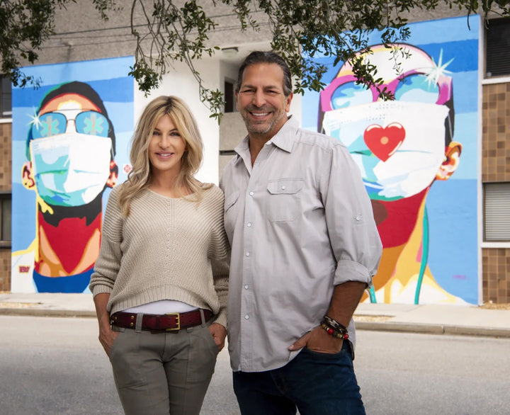 Donda Mullis and Ronnie Shugar in front of Sarasota Heroes Mural
