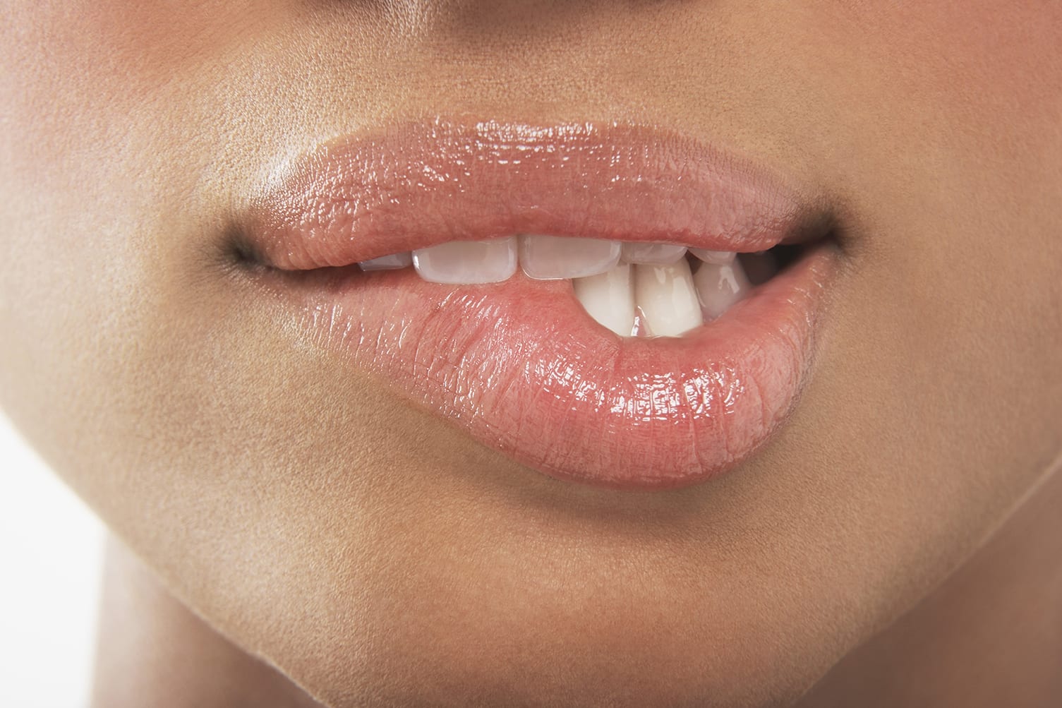 Person biting their bottom lip