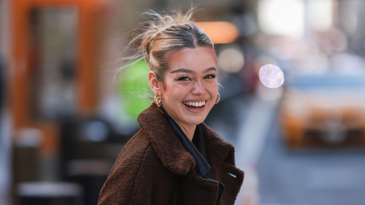 girl with updo hair style smiling
