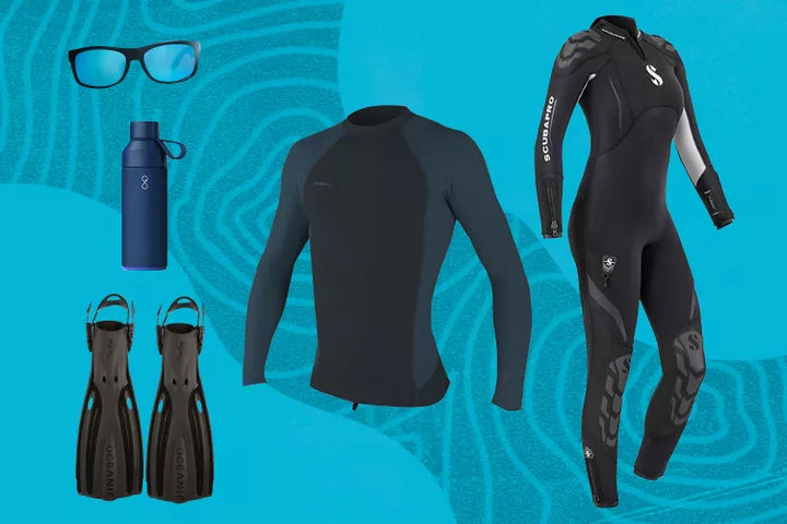 travel + leisure scuba gear on blue swirl background