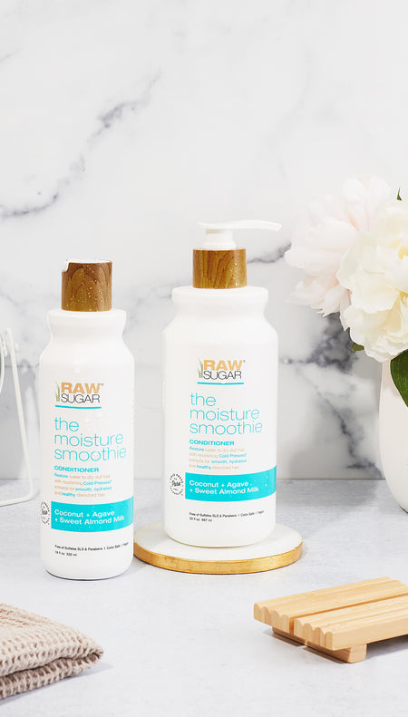 moisture smoothie shampoo and conditioner in white bathroom on marble