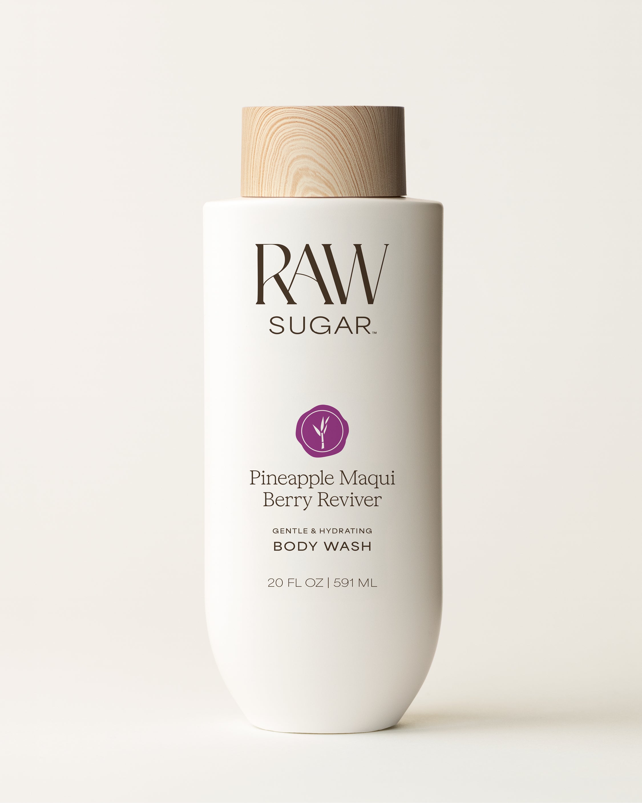 RAW Sugar Pineapple Maqui Berry Reviver body wash bottle on a white background