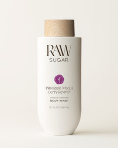 RAW Sugar Pineapple Maqui Berry Reviver body wash bottle on a white background