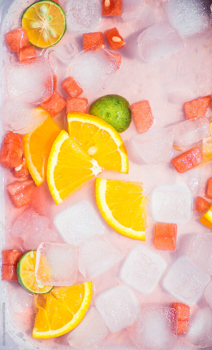 Mix of Ice and Grapefruit and Orange Pieces