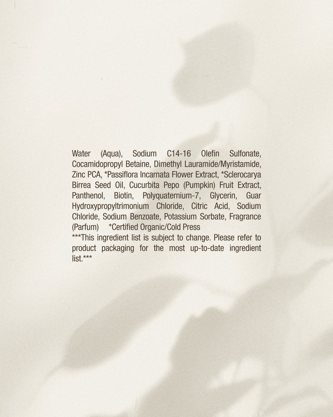 Ingredients list on a beige background with soft shadows