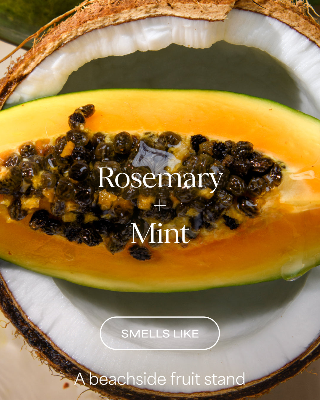 Halved papaya with rosemary and mint on a white plate, labeled 'Rosemary + Mint'.