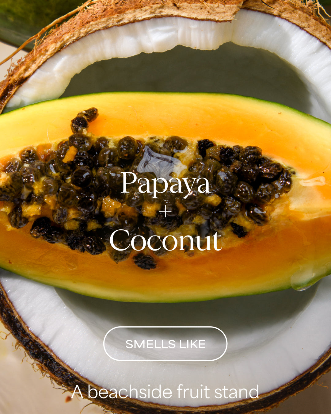 Halved papaya with coconut meat on a white plate, labeled 'Papaya + Coconut'.