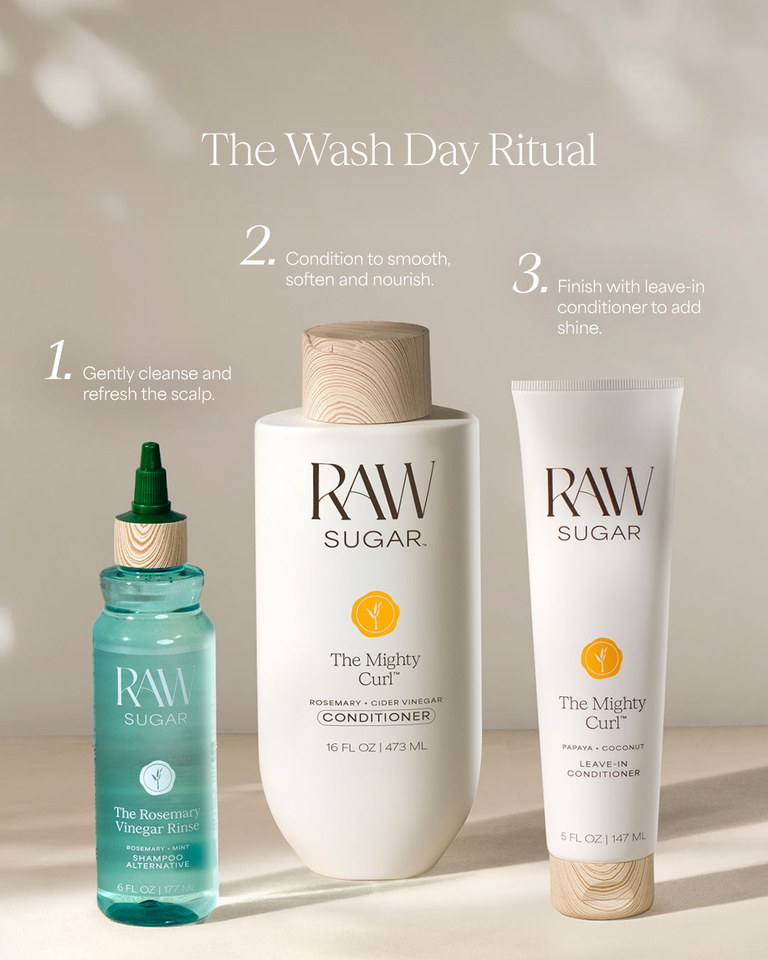 RAW Sugar hair care products with step-by-step instructions for a wash day hair ritual on a neutral background