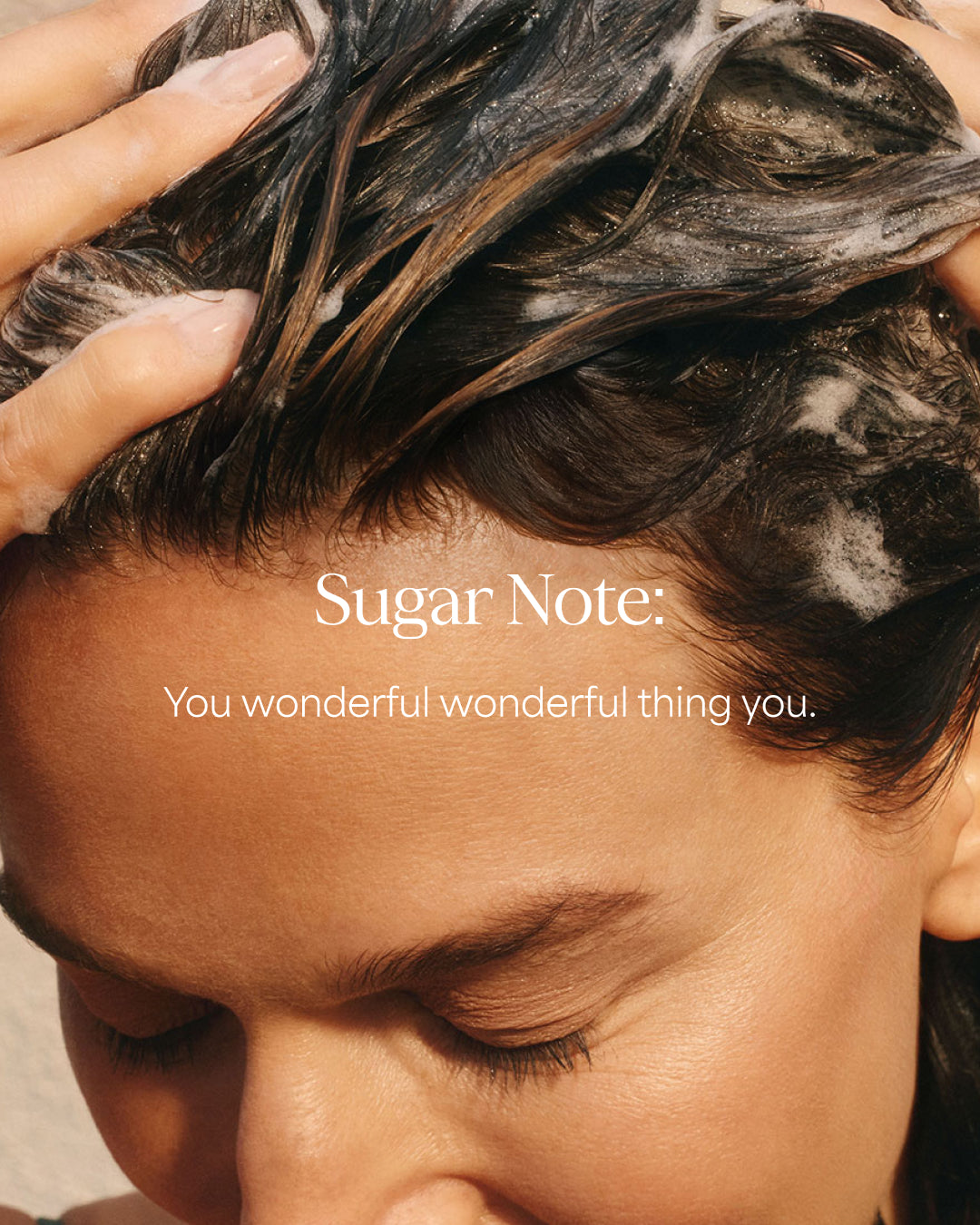 Person applying hair product with 'Sugar Note' text overlay