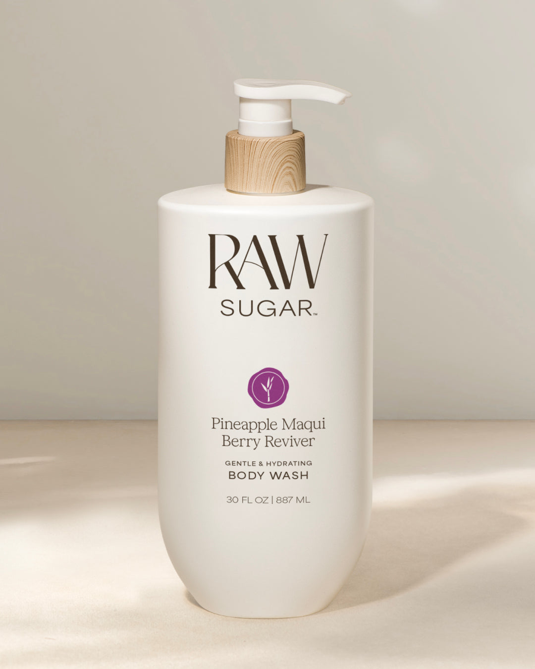RAW Sugar body wash bottle on a light background